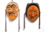 Traditional Korean Hahoe masks, Yang-ban the aristocrat and Bu-ne the flirtatious young woman 